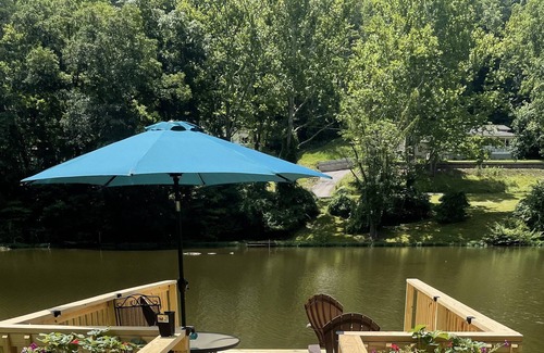 Cross Lanes Cabin | Peaceful fishin’ camp on a lake, bring your dog, and fishing pole.