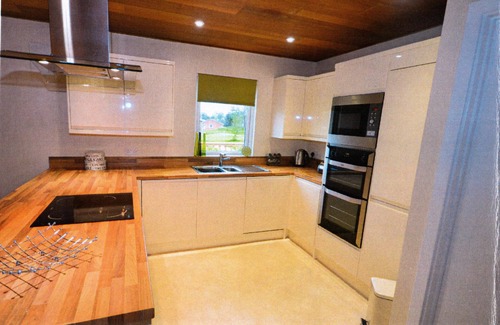 Woolfardisworthy House | Peaceful, luxury, allergy &smoke-free lodge.Hot tub, Fishing, dog-friendly, surf