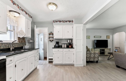 Lakeside House | Peaceful Pastel - Cheerful Cottage Close to Pere Marquette and Muskegon Lake - Pet Friendly