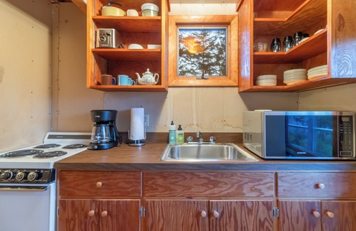 Southwest Harbor House | Peaceful private woodland home, open and airy, with ocean views and fire pit