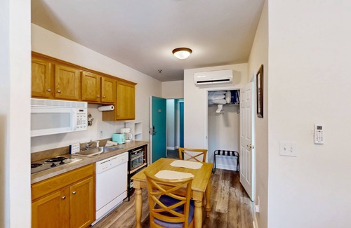 Huddleston Apartment | Peaceful resort studio with shared pool, hot tub, beach, game room & lake access
