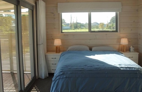 Wainui House | Peaceful Wainui Beach Holiday Home