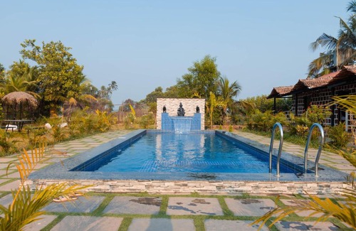 Nagoa House | Peacock Retreat 5BR Cottages with Private Pool & Scenic Views Saligao