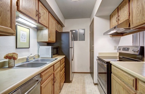 Frisco Condo | Peak One 206: Cozy 2BR condo in Frisco with wooded view, sleeps 5—comfort in every stay.