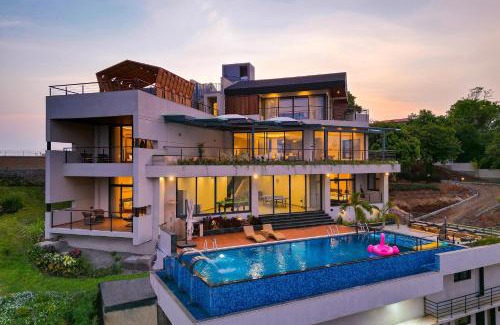 Igatpuri Villa | Pearl Lakeview Mansion by StayVista - Lakeside villa with Infinity pool, Jacuzzi, In-house theatre & Games room