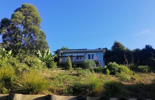 Tutukaka Cottage | Pebble cottage. Tutukaka Coast. Short walk to a nearby beach. Pet friendly.