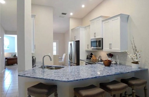 Pelican Bay Condo | Pelican Bay 3-bedroom condo in lovely Naples with AC, WiFi pool beach amenities