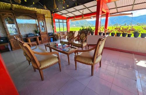 Agam House | Penginapan Syariah Bunga Sonsang