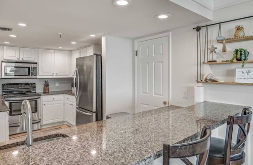 Holiday Isle Condo | Pent house #605 at Water View Towers! Stuning Views! Boat Slip Available
