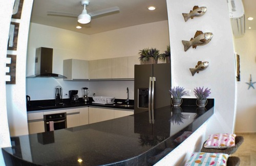 Chicxulub Puerto Condo | Penthouse de lujo en la playa