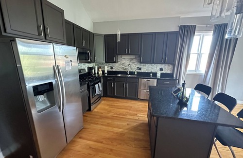Grand Boulevard Condo | Penthouse Condo in Chicago featuring Zero Gravity Massage Chair