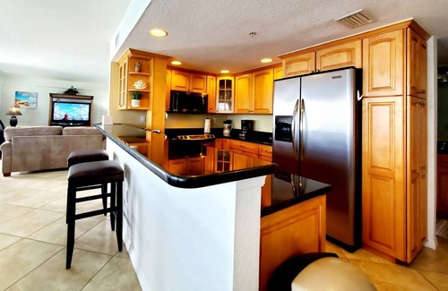 Clearwater Beach Condo | Penthouse Corner Unit w/Gulf and Harbor Views! Pool, Grill, Fishing Dock, Wi-Fi, W/D ~ 601 Dockside