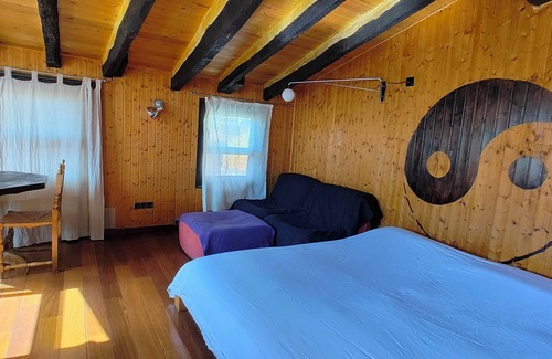 Olot Apartment | Penthouse-loft with natural light and sun all day overlooking the city center.