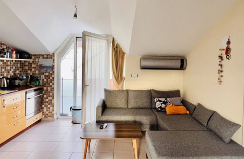 Datca City Center Apartment | Penthouse on the beach, modernly furnished. Above the roofs of Datça.
