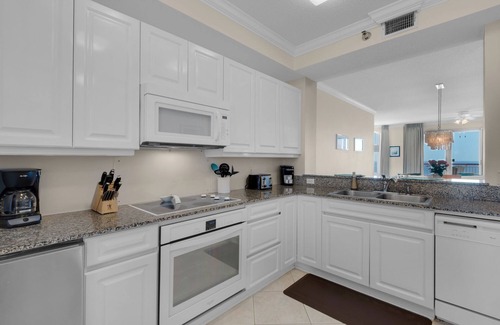Navarre Beach Condo | PENTHOUSE - TOP FLOOR - BEACHFRONT & CHAIRS - POOL - BALCONY - GYM-NEW ELEVATORS