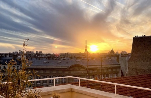 6th Arrondissement Apartment | Penthouse with Sunset Terrace and Eiffel Tower View in Saint Germain