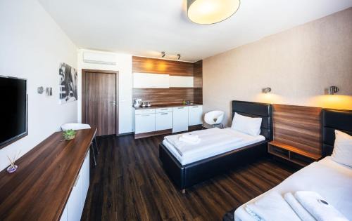 Olomouc House | Penzion v jízdárně