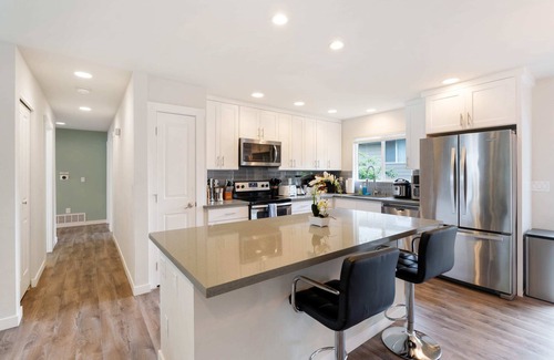 Rainier Valley House | Perch - Kubota Family Home: Spacious 5BR home with dual living room