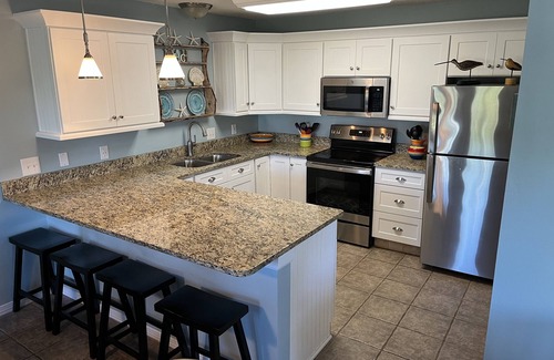 Gulf Place Condo | Perfect Beach Getaway! 2 BR 2 BA Ground floor End Unit! Steps From The Beach!