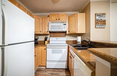 Townsite Condo | Perfect Relaxing Getaway with Heated Pool and Gym!