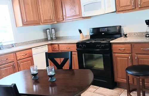 Winthrop Harbor House | Perfectly Cozy! Close to so many places. Pet friendly. Great private backyard.