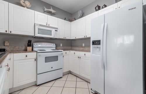 Frangista Beach Condo | Pet Friendly! 3rd floor overlooks pool, private beach access, hot tub