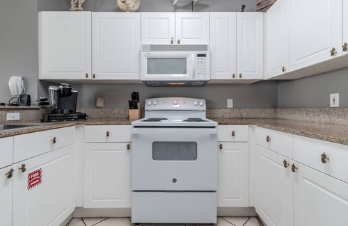 Frangista Beach Condo | Pet Friendly! 3rd floor overlooks pool, private beach access, hot tub