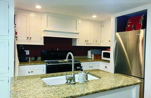 Garden City House | Pet friendly! Across from the Pools! Includes a golf cart!