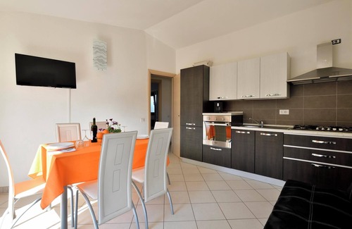 Cala Gonone Apartment | Pet Friendly Apartment 'Casa con vista mare e monti' with Sea View, Terrace & Wi-Fi