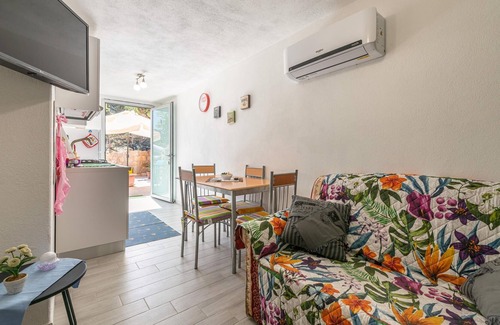 Villasimius Apartment | Pet-friendly Apartment Paraiso Sardo 2 with Sea & Mountain View, A/C, Wi-Fi, Garden & Terrace