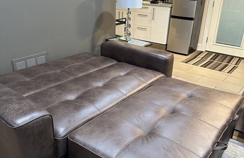 Belmont House | Pet friendly apartment with covered patio and fenced-in yard.