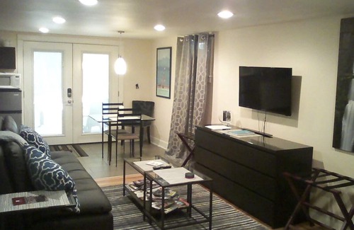 Belmont House | Pet friendly apartment with covered patio and fenced-in yard.