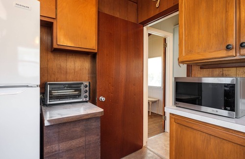 Butler Beach House | Pet Friendly Oceanfront Cottage -Deck Dining+ Direct Access Path to the Beach!