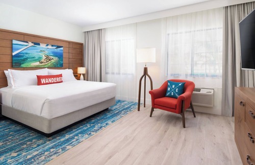 Park Shore Hotel | Pet-Friendly Studio Suite Perfect for Tropical Getaway with Pool View