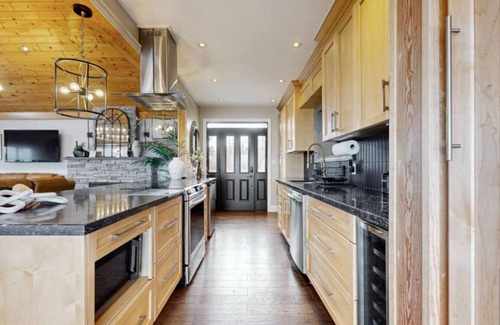 Bowmanville Cottage | Pet Friendly, water front Cottage Getaway in Bowmanville with hot tub & more…