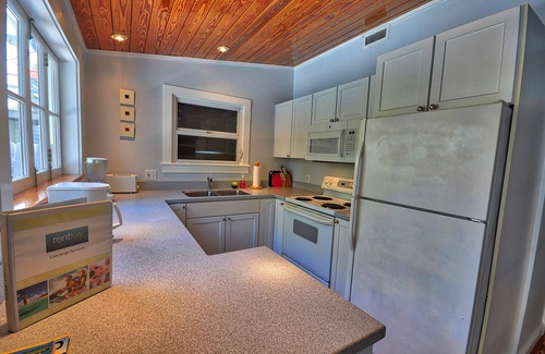 Uptown - Upper Duval Cottage | Pete's East Cottage: Cypress east cottage steps from Duval