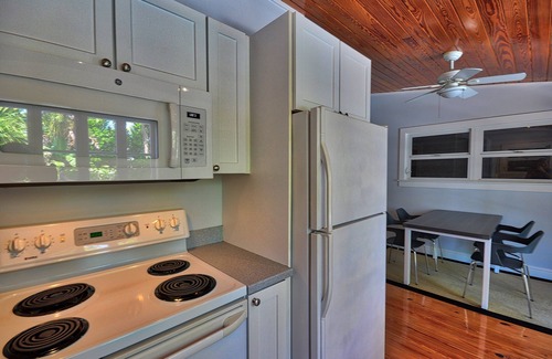 Uptown - Upper Duval Cottage | Pete's East Cottage: Cypress east cottage steps from Duval