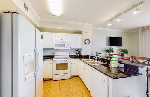Panama City Beach Condo | Picture-perfect Gulf front condo with gym, pools, hot tub & sauna