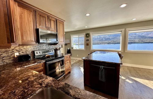 Ketchikan Apartment | Picture Perfect on the Water with large deck for spotting whales, eagles & more!