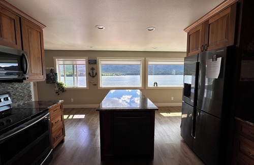 Ketchikan Apartment | Picture Perfect on the Water with large deck for spotting whales, eagles & more!