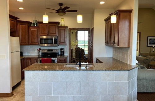 Greenwich House | Picturesque Brick Home In Country, 1 Mile from East Lake and Osage Nature Trail!