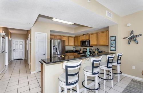Navarre Beach Apartment | Pier Serenity: Newly Renovated! Sleeps 8! Heated Pool and Hot Tub!