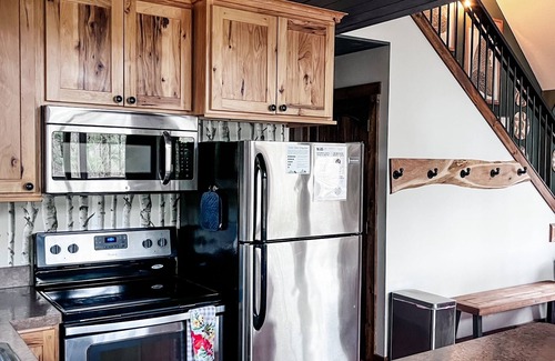 Butler Cabin | Pine Lane is your cozy, pet-friendly escape -w/hot tub, fire pit, & peaceful vibes near Mohican