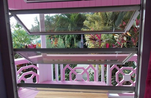 St. John's Cottage | PINKSHACK STUDIO COTTAGE IN JUNGLE THEMED PATIO GARDEN