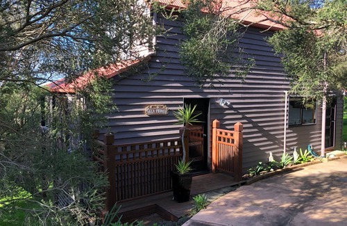 St. Andrews Beach Cottage | Pirongia Villa, high on a hill, beach is 200m walk away.