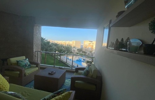 Sidi Bouqnadel Apartment | Plage des Nations beautifully decorated apartment with a swimming pool view