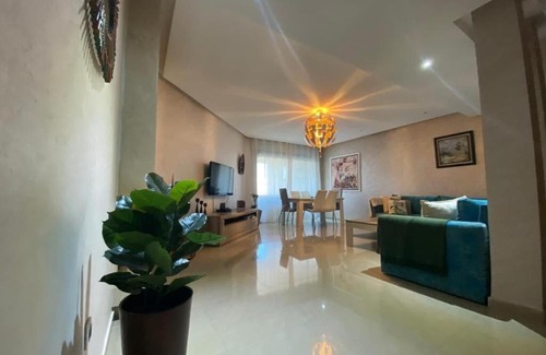 Sidi Bouqnadel Apartment | Plage des Nations beautifully decorated apartment with a swimming pool view
