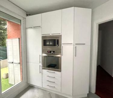 Penacastillo Apartment | planta baja-jardín-Parking
