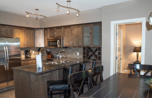South Pandosy Condo | Playa Del Sol Two Bedroom With Den with walkout to quiet courtyard on 3rd floor.