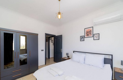 Lara Apartment | Pleasant Apartment with Balcony in Aksu